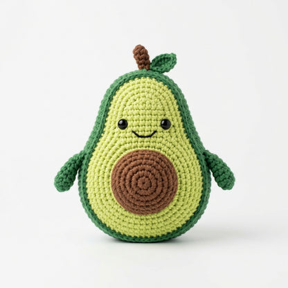 Avocado held in hands demonstrating tactile plush scale and soft texture