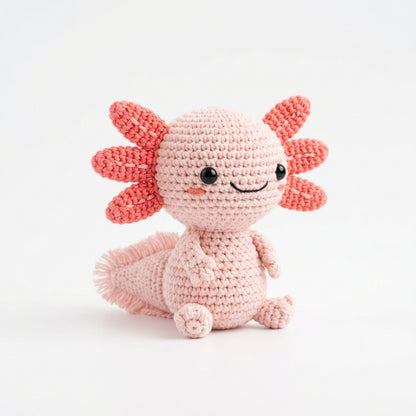 Pastel Axolotl Amigurumi Pattern held in hands demonstrating tactile plush scale and soft texture