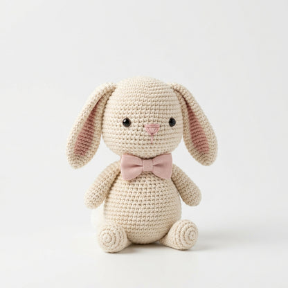 Bunny held in hands demonstrating tactile plush scale and soft texture