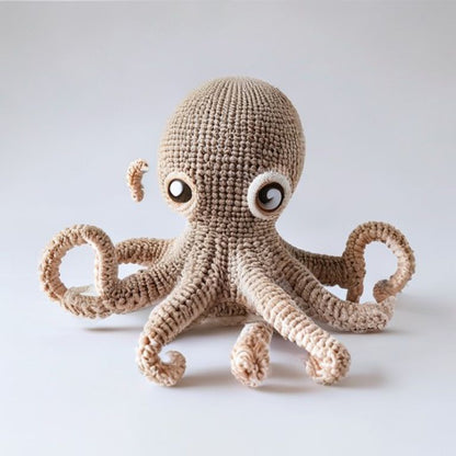 Octopus held in hands demonstrating tactile plush scale and soft texture