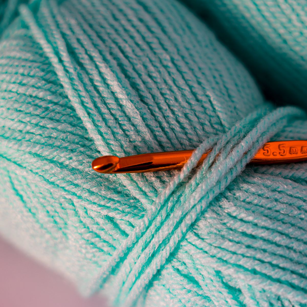 Avocado close-up macro zoom showing yarn loop texture and invisible decrease stitches