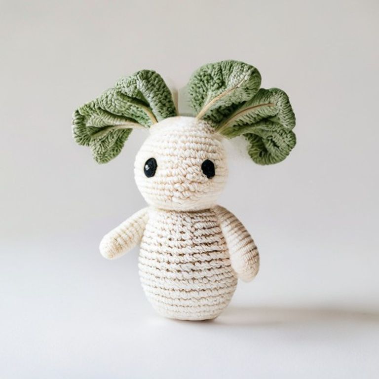 Happy Garden Radish Pattern held in hands demonstrating tactile plush scale and soft texture